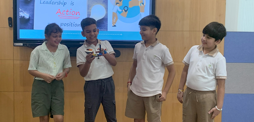 children at MRIS sec 24 explaining the six transdisciplinary themes